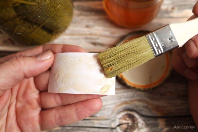 applying gelatin glue to back of label