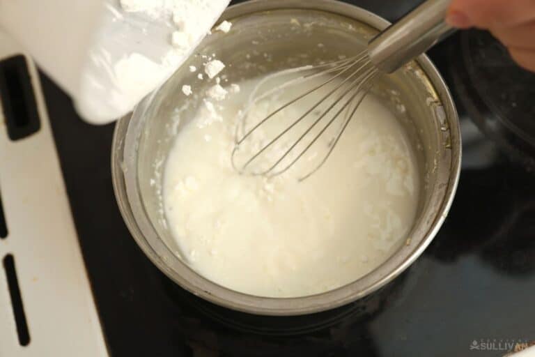 whisking cornstarch and water in pan