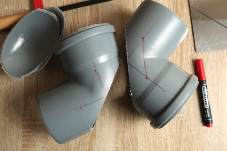 two PVC elbows cut