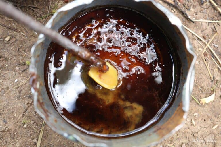adding beeswax to melted sap