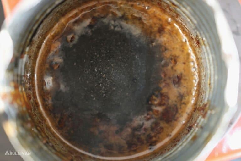 adding charcoal to melted resin