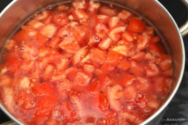 chopped tomatoes in saucepan