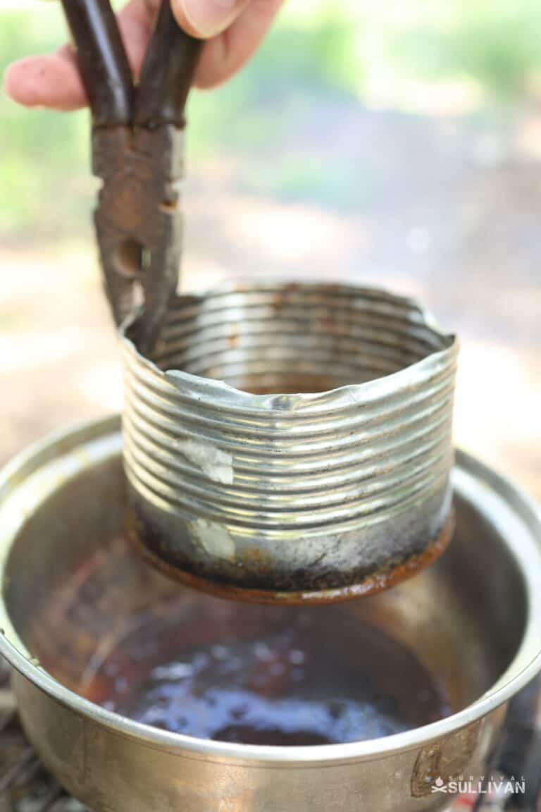lifting smaller can with pliers