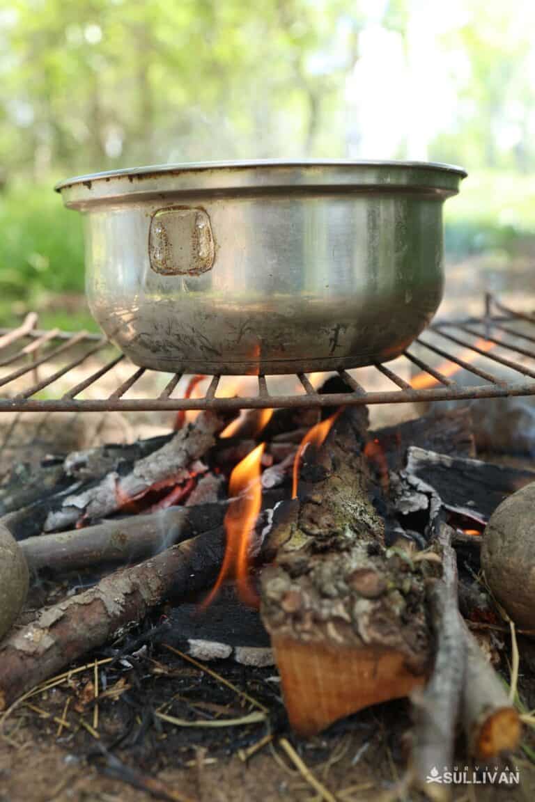 metal container over outdoor fire