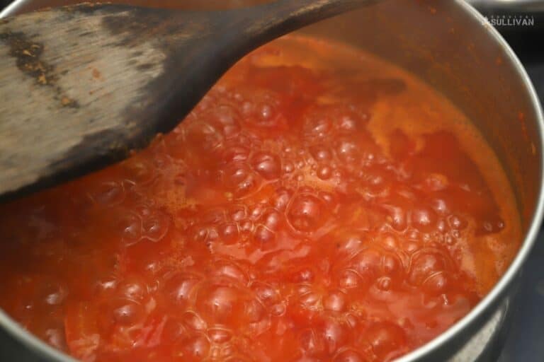simmering crushed tomatoes